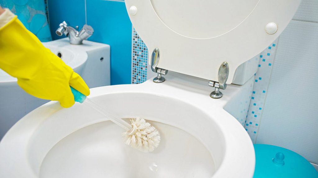 cleaning toilet
